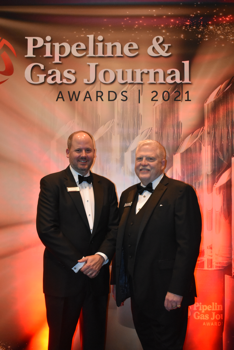 Pipeline & Gas Journal Publisher Andy McDowell, left, poses with Master of Ceremonies Russel Treat at the inaugural Pipeline & Gas Journal Awards in Houston on Thursday evening. 