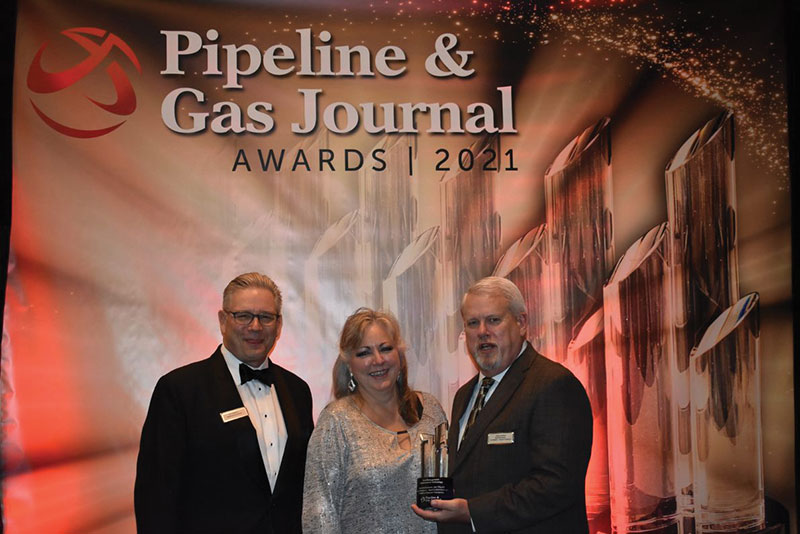 Jim Watkins of PGJ, left, poses with Rhonda and Greg Lankford of SpactraSensors at the inaugural PGJ Awards in November. 
